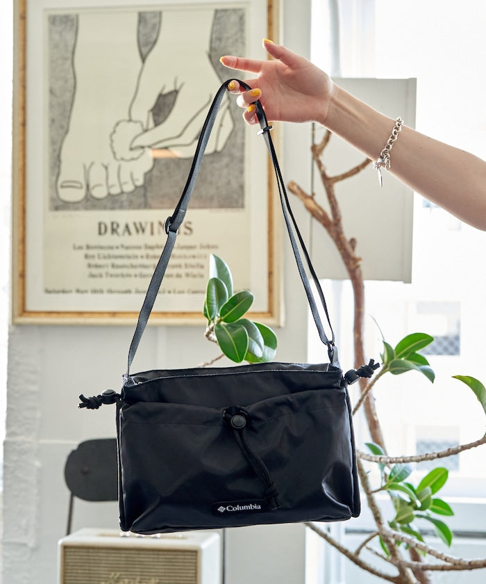 Columbia JUMP CREEK 斜背束口包